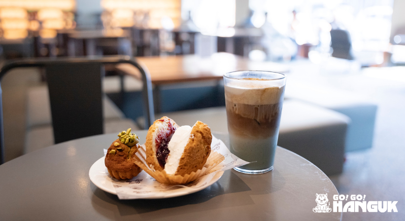 Iced coffee and some desserts on a table