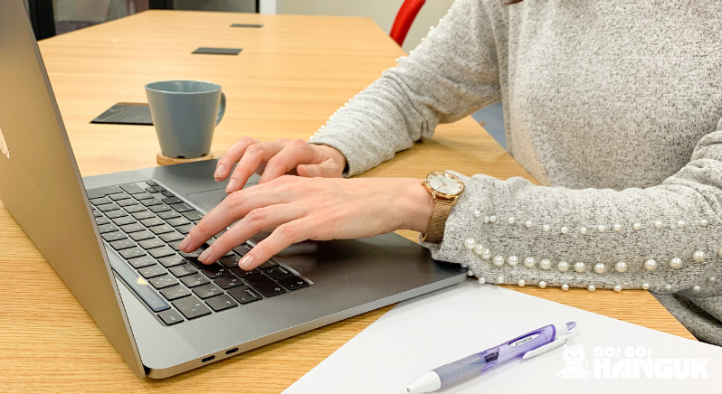 Person typing on a laptop